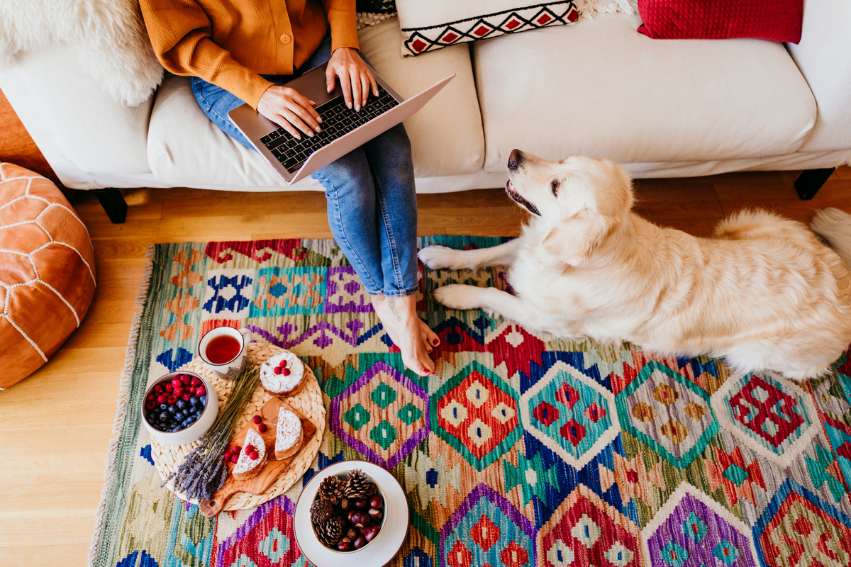 Woman Working at Home with Pet Dog